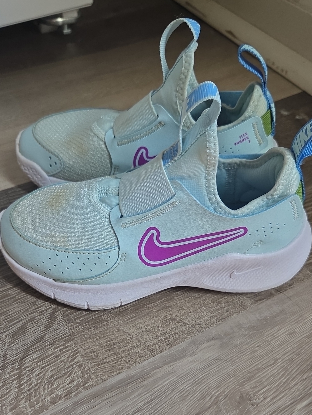 Nike Kids Light Blue Sneakers with Purple Swoosh
